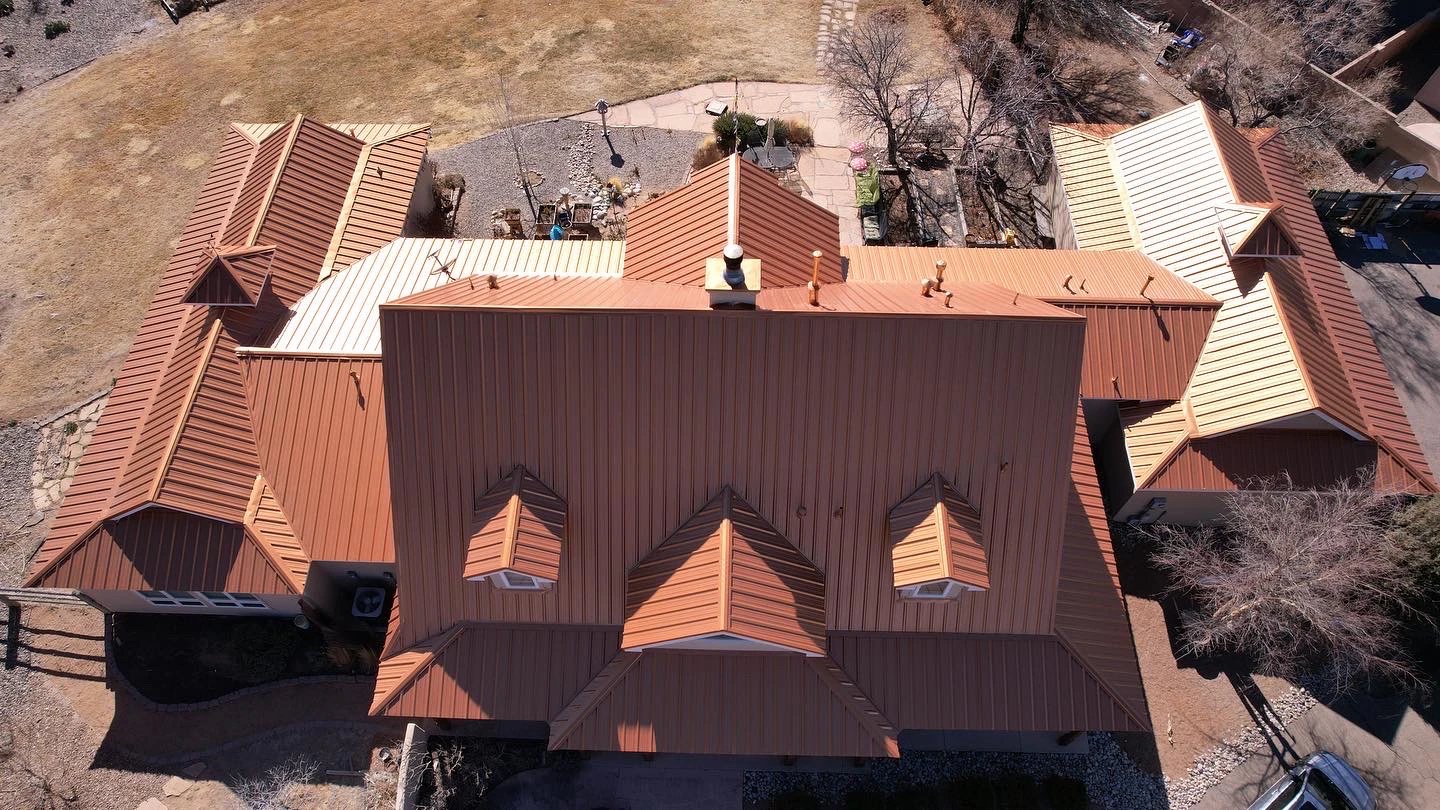 Copper standing-seam metal roof on a New Mexico home